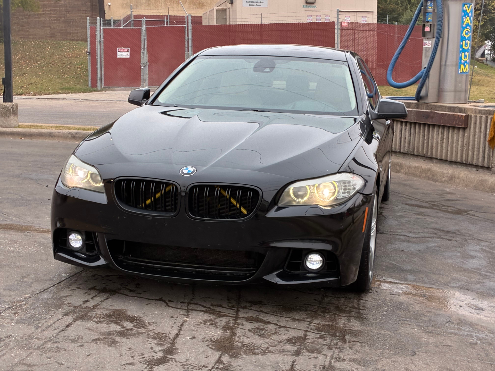 Black BMW 5 Series front view