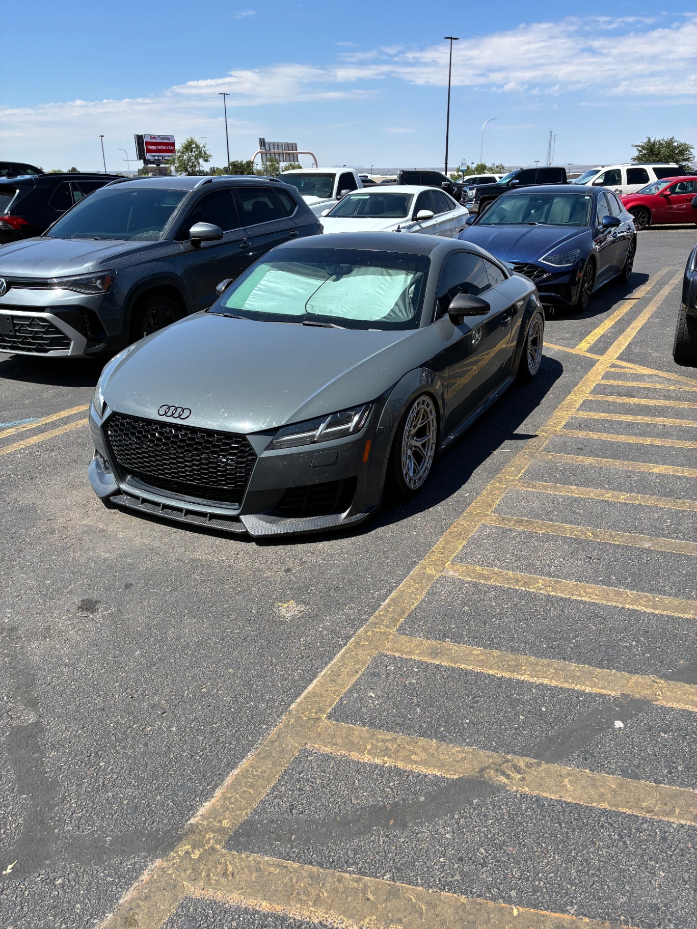 Gray Audi TTS parked in a lot