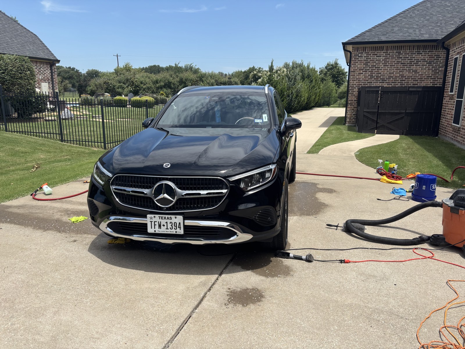 Black Mercedes GLC detailed in the driveway