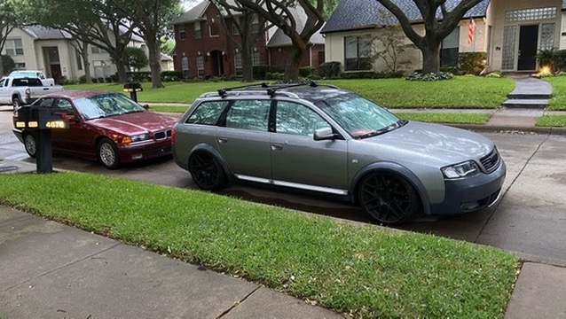 Gray Audi Allroad parked at the curb