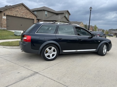 Black Audi Allroad wagon side profile