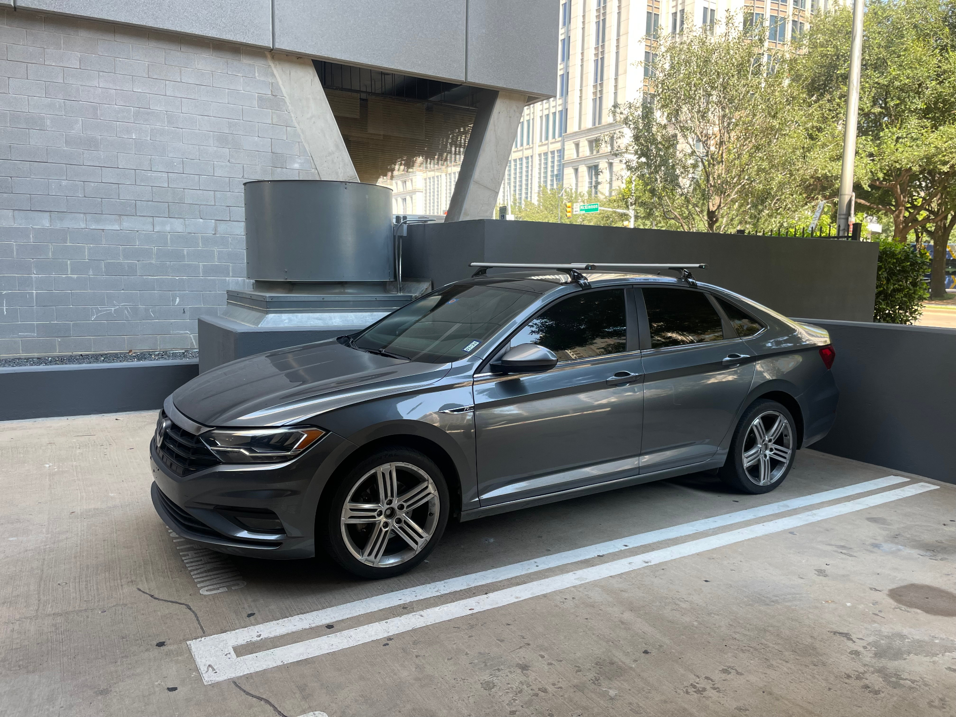 Gray Volkswagen Jetta R-Line parked downtown